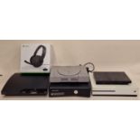 Collection of game consoles to include PlayStation and Xbox together with a boxed Xbox headset.