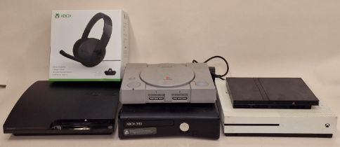 Collection of game consoles to include PlayStation and Xbox together with a boxed Xbox headset.