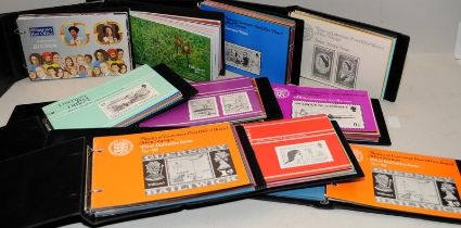 Ten albums Guernsey mint stamps Presentation Packs.