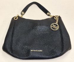 Michael Kors brown ladies leather handbag.