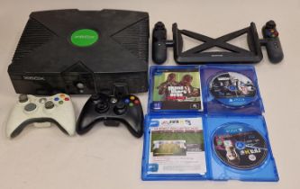 Microsoft Xbox console together with two controllers, two PS4 games and an accessory. This lot has