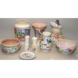 A collection of mid to late 20thC Poole Pottery in the traditional pattern. Nine pieces in lot