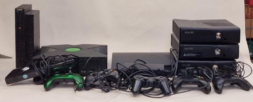 Collection of game consoles to include PlayStation and Xbox together with a collection of leads,