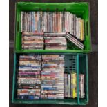 Two trays containing a large collection of DVD's.