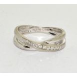 9ct White Gold Diamond Twist Ring. H/M 0.1ct. Size L