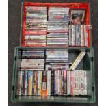 Two trays containing a large collection of DVD's.
