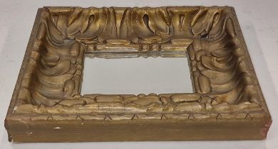 A painted wall mirror in the Art Nouveau style 34x28cm.