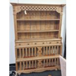 Irish antique pine stepped multi purpose kitchen dresser having twin shelves over triple draws