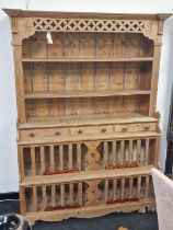 Irish antique pine stepped multi purpose kitchen dresser having twin shelves over triple draws