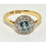 Aqua/Diamond 18ct gold daisy ring Size N, 3.5g