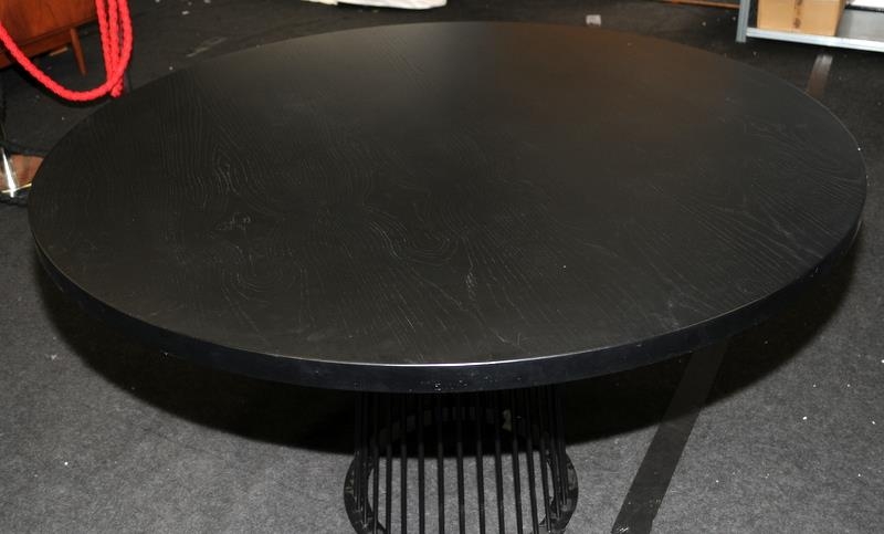Large circular dining table with solid ebonised to supported by black powdercoated metal carousel - Image 3 of 4