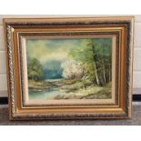 Gilt framed oil on canvas painting of a river scene signed "Jenrin" 58x48cm.