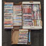 Three trays containing a large collection of DVD's.