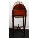 Contemporary mahogany dome topped bottle store on tapering square legs with 'x' stretcher. Holds 4