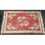 Chinese Pink oblong room rug with cream surround and Dragon design 260x160cm