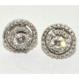 Diamond earrings 18ct white gold, screw backs, centre stones approx 0.33 each, surrounded by two