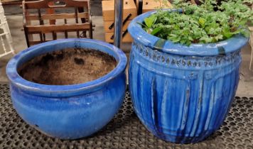 Two blue terracotta plant pots the largest measuring 50cm tall with a 48cm diameter.