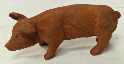 A small cast iron pig (141)