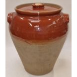 Large 19th century stoneware olive storage jar with lid 45cm tall.