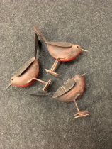 Three tinplate robins. (149)