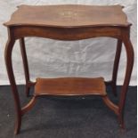 Edwardian mahogany lamp table with inlaid top surface standing on cabriole legs with an inlaid under