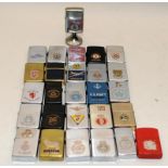 Collection of mostly Zippo lighters, mainly featuring military crests. Total 27 in lot