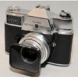 Vintage Kodak Retina Reflex IV 35mm slr with 35mm lens. Shutter fires and film advance is smooth.