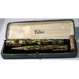 Cased Parker Duofold Senior fountain pen and propelling pencil set. Moderne pearl and black marble