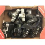 Collection of vintage 35mm SLR film cameras to include Nikon and Pentax. 8 in lot