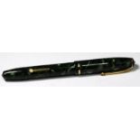 Conway Stewart No.15 fountain pen. Black lined green and pearl marble body. Near mint. (Ref:EW130)