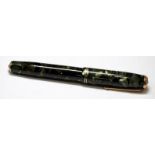 Parker Duofold fountain pen. 1937 date mark. Green marble body and 14ct Newhaven nib. Twin