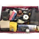 A large crate of vintage photographic accessories and attachments. Some leading brands. Good lot