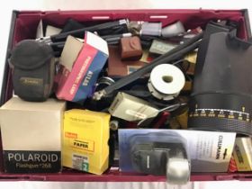 A large crate of vintage photographic accessories and attachments. Some leading brands. Good lot