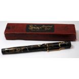 Boxed Swan L205/47 leverless fountain pen. Black and gold with white lining body. Excellent