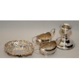 A collection of antique hallmarked sterling silver items to include a weighted base squat