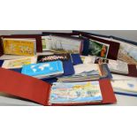 Ten albums of Jersey mint stamps presentation packs