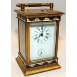 Vintage mechanical carriage clock with alarm function. Case of brass construction with bevelled