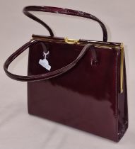 Ladies patent Oxblood colour handbag by "Hamilton Handbags"