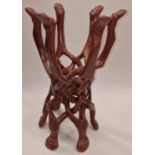 Tribal wooden intricately carved collapsible table base. Hand carved from one piece of wood 52cm