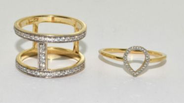 Two modernist CZ gold on 925 silver rings size P 1/2 and R 1/2.