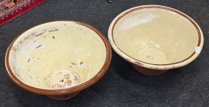 Pair of antique terracotta dairy bowls.