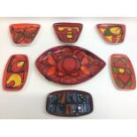 Poole Pottery Delphis to include eye dish, pin trays & trapeziums (7)