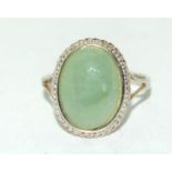 A 925 silver and oval jadeite ring size O