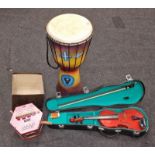 Collection of musical instruments to include cased violin, German Squeezebox and a drum (3).