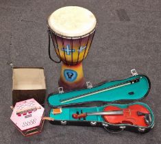 Collection of musical instruments to include cased violin, German Squeezebox and a drum (3).