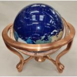 Large contempoary gem set revolving globe of the world.