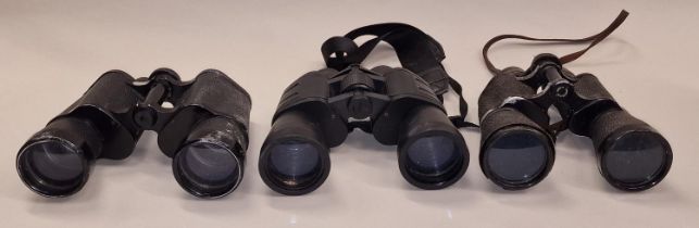 Three pairs of binoculars. Various makes and models.