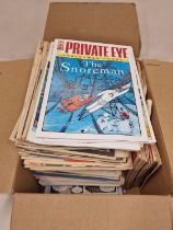 A box of vintage Private Eye magazines.