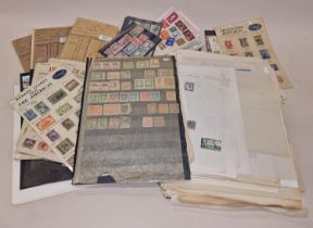 Box of world stamps on album pages and stock cards, approval books etc.