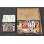 Large collection of vintage photographic 35mm slides within a suitcase and box. Includes The White